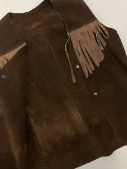 Gilet in pelle con frange