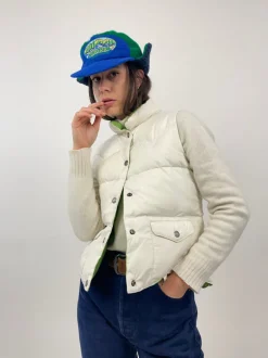 Piumino smanicato double-face